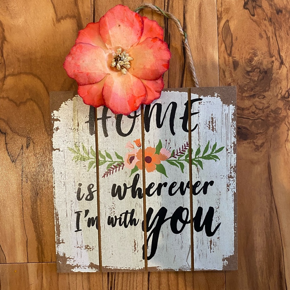 Small, lightweight, decorative wooden sign.